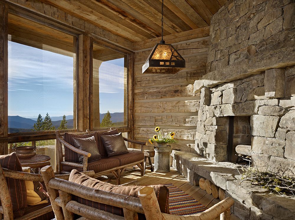 View outside the window and stone walls shape an idyllic rustic sunroom [From: Yellowstone Traditions / Benjamin Benschneider Photography]