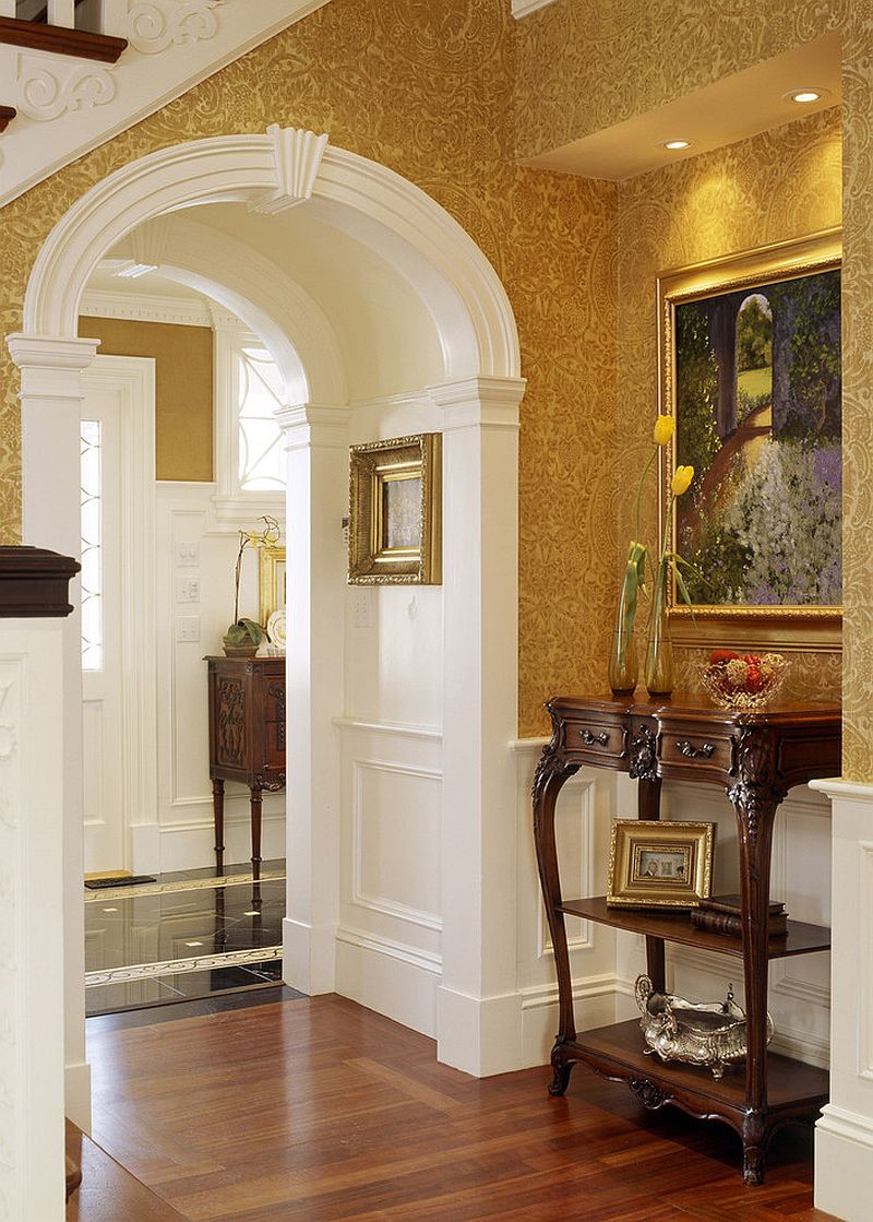 Wallpaper brings warmth of yellow to the Victorian style entry [Design: Siemasko + Verbridge]