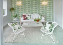 Wallpaper-with-bold-tropical-leaf-motif-creates-the-ideal-backdrop-for-a-relaxing-sunroom-217x155