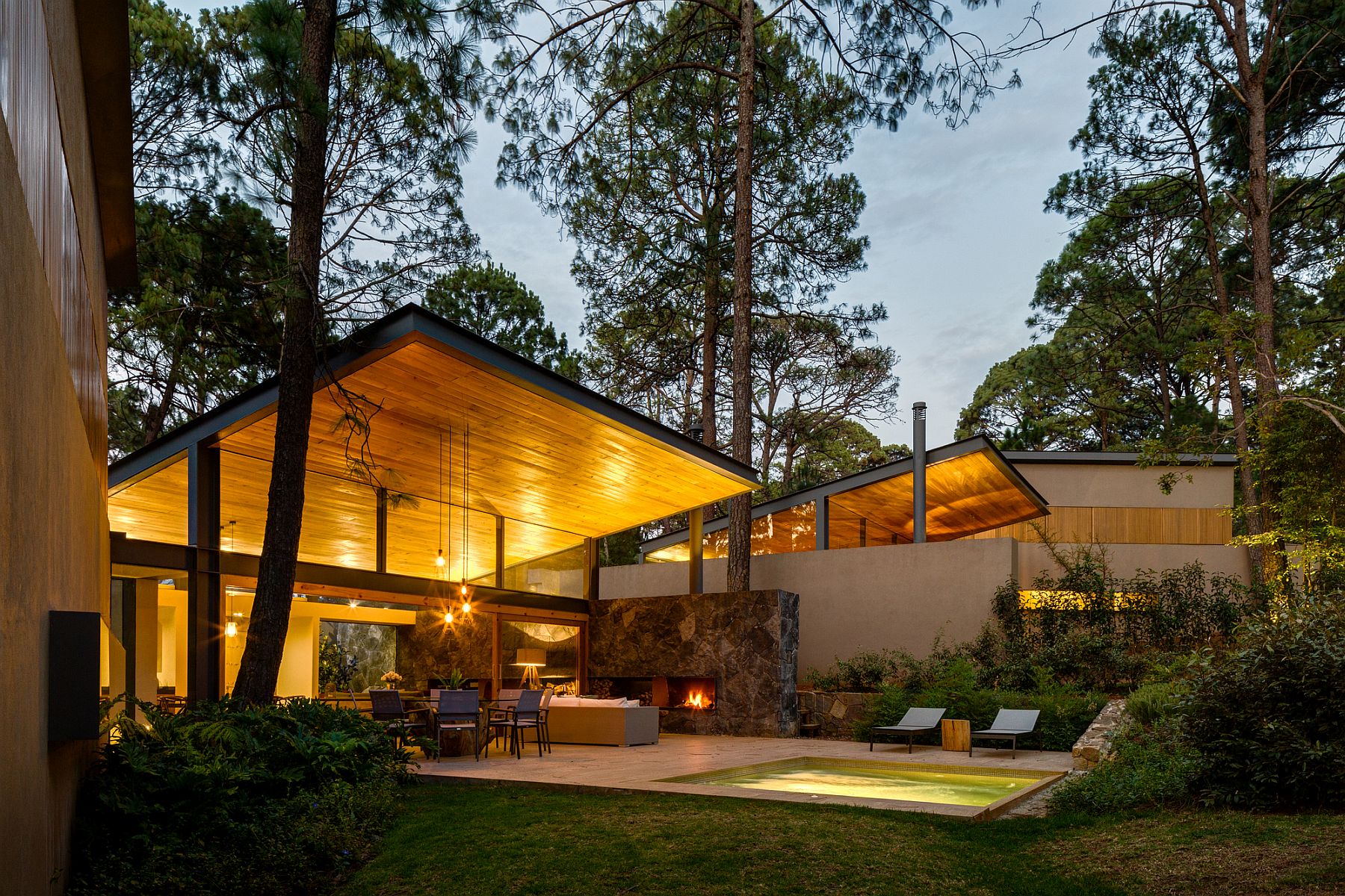 Warm wooden ceiling gives the house an inviting, yet modern appeal