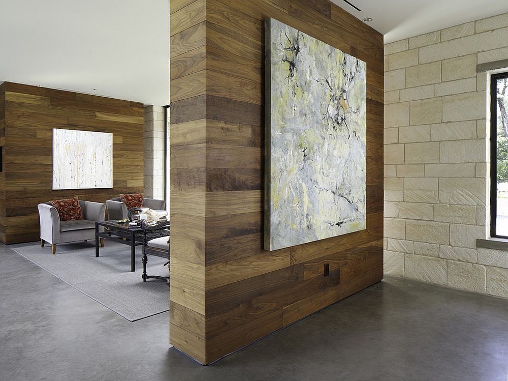 Woodsy room divider also allows you to showcase wall art [Design: Cornerstone Architects / Photography by Andrew Pogue]