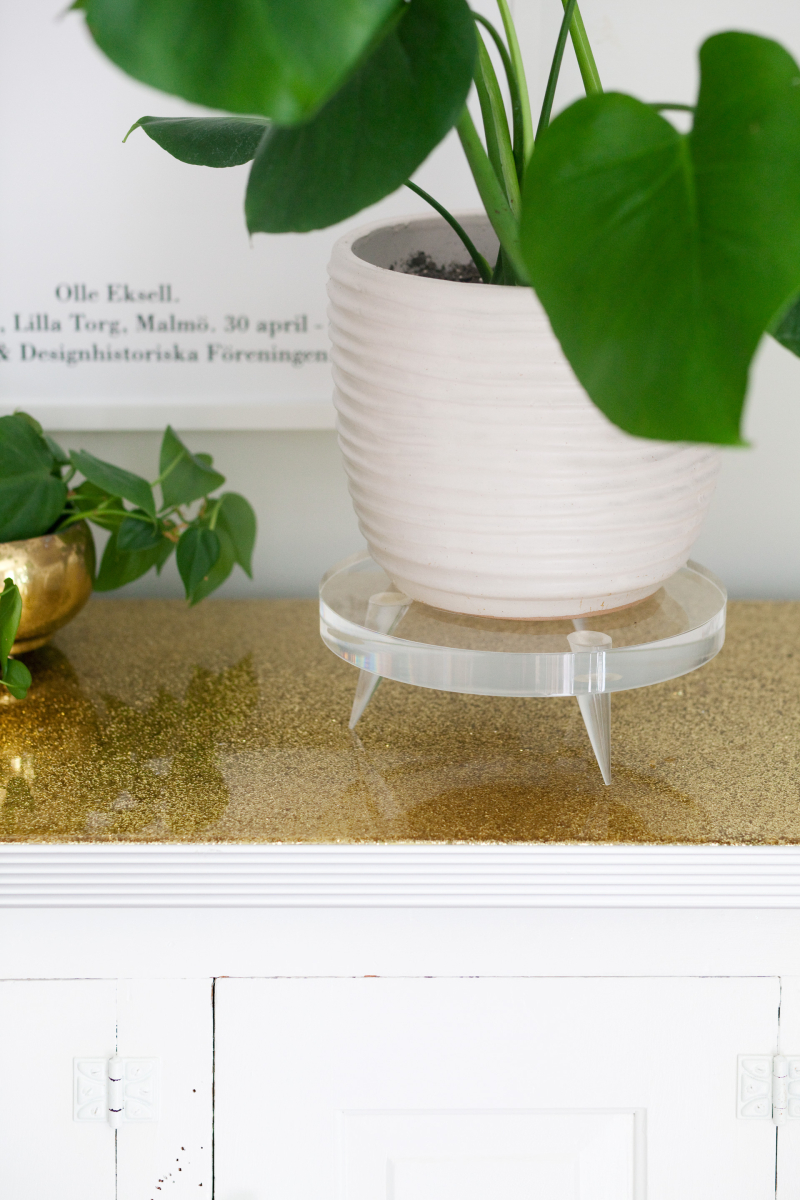 Acrylic plant pedestal from A Beautiful Mess