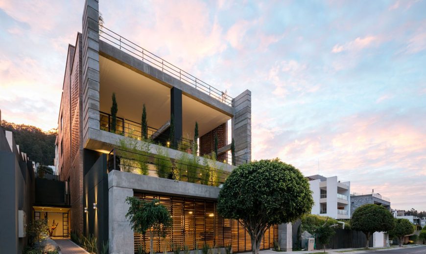 A Green Façade: Distinct Double-Story Porch Greets You at Zambeze