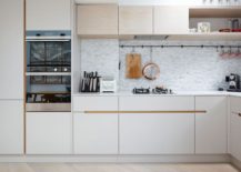 Beautiful-tiled-backsplash-for-the-small-kitchen-in-white-with-smart-white-cabinets-217x155