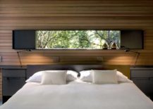 Bedroom-with-a-window-above-the-headboard-that-offers-a-view-of-the-outdoors-217x155