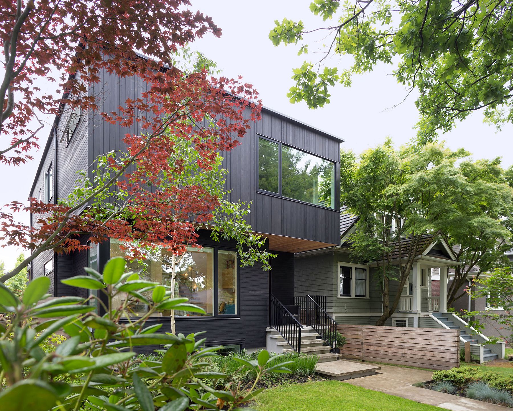 Contemporary Vancouver home with dark cedar exterior and cantilevered top level