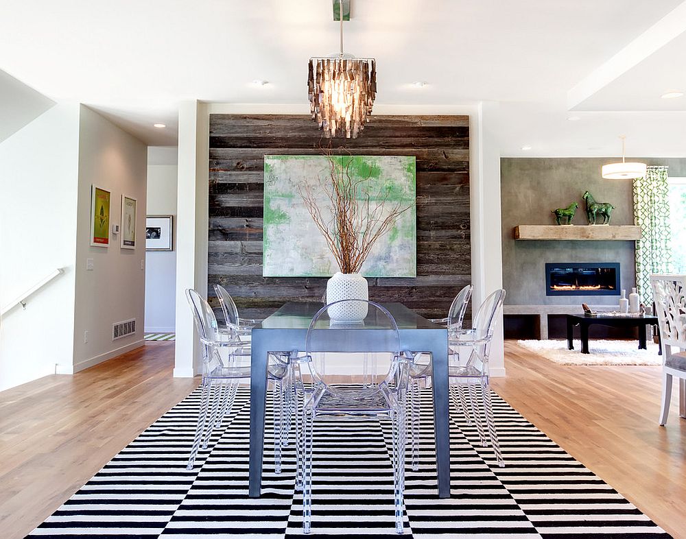 Contemporary dining room with acrylic dining tables and reclaimed wood accent wall