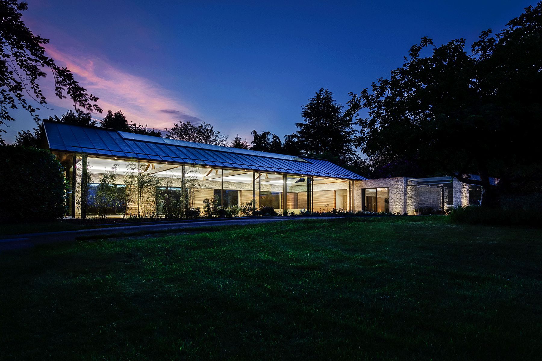 Copper-pitched-roof-gives-the-contemporary-pool-house-spa-and-gym-a-unique-identity