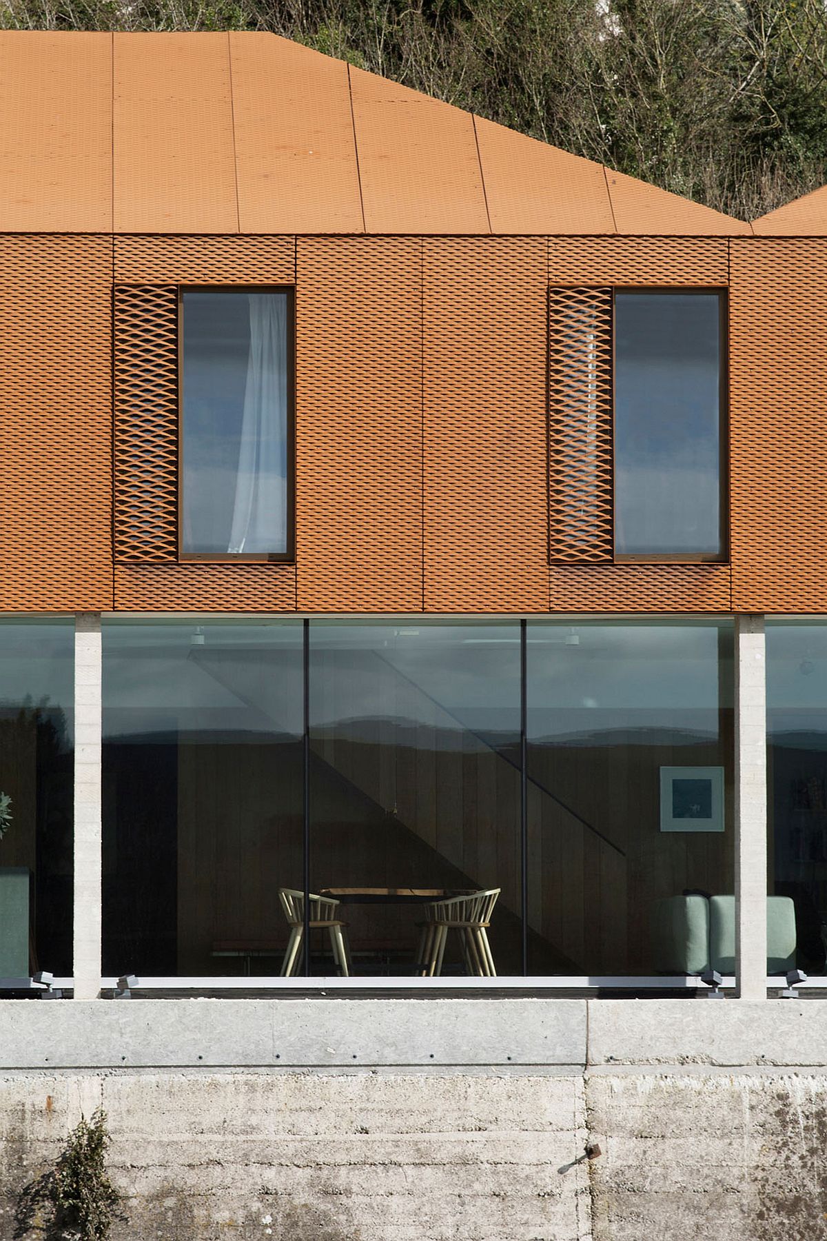 Cor-ten steel walls and roof of the home in South Downs National Park