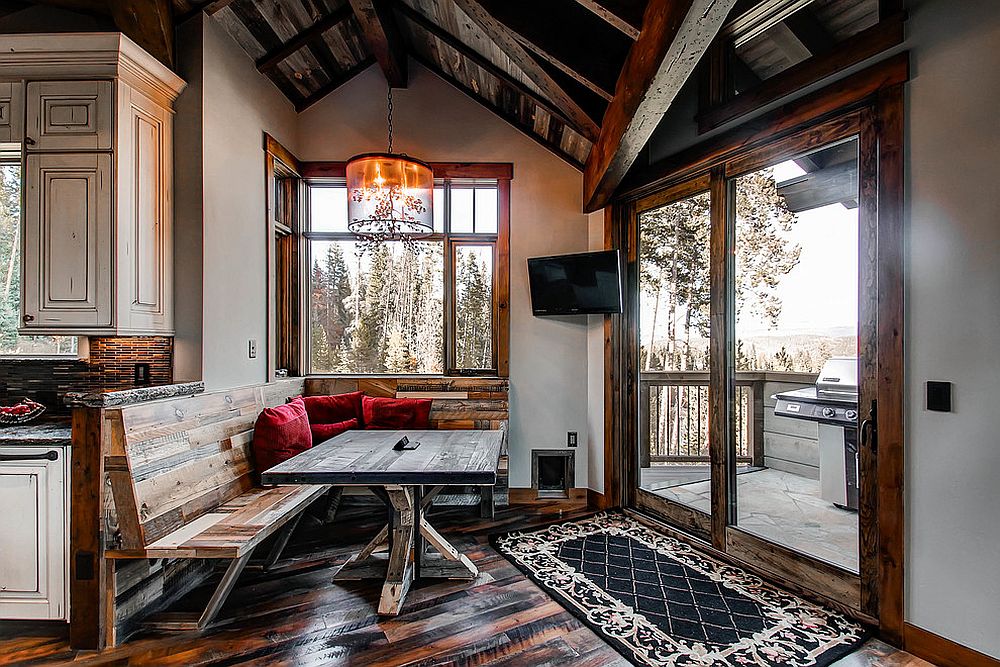 Corner seating and dining table crafted from reclaimed wood [Design: Pinnacle Mountain Homes]