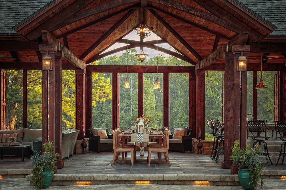 Covered rustic patio of Austin home with gorgeous green views