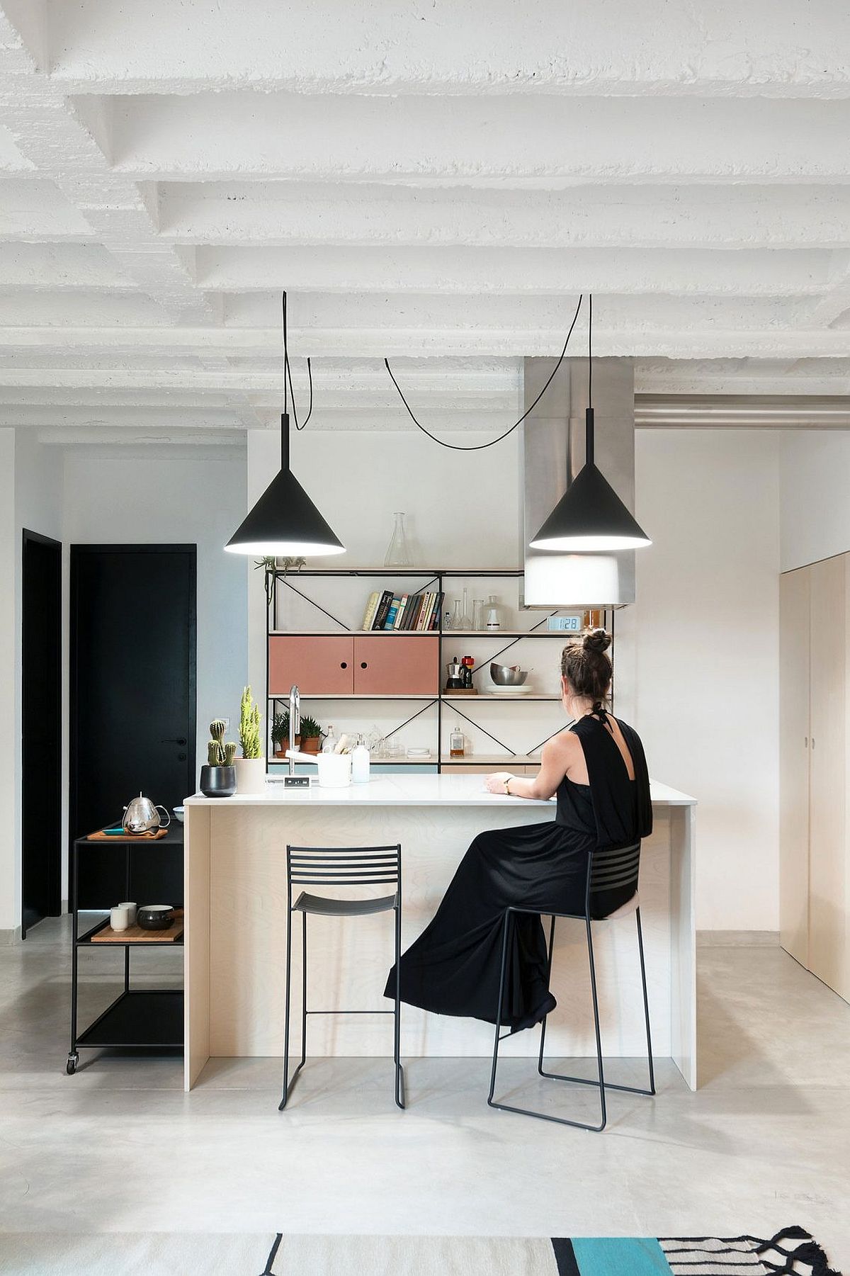 Custom kitchen island and decor for the apartment designed by Studio AUTORI