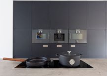Dark-wall-of-cabinets-and-appliances-in-the-kitchen-217x155