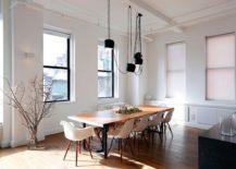 Dashing-and-dark-pendant-light-above-the-dining-table-in-black-217x155