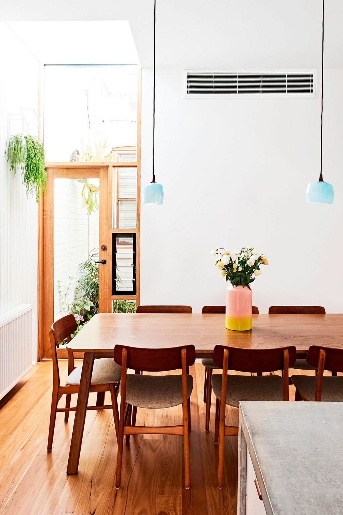 Dining area inside the renovated terrace house in Fitzroy North