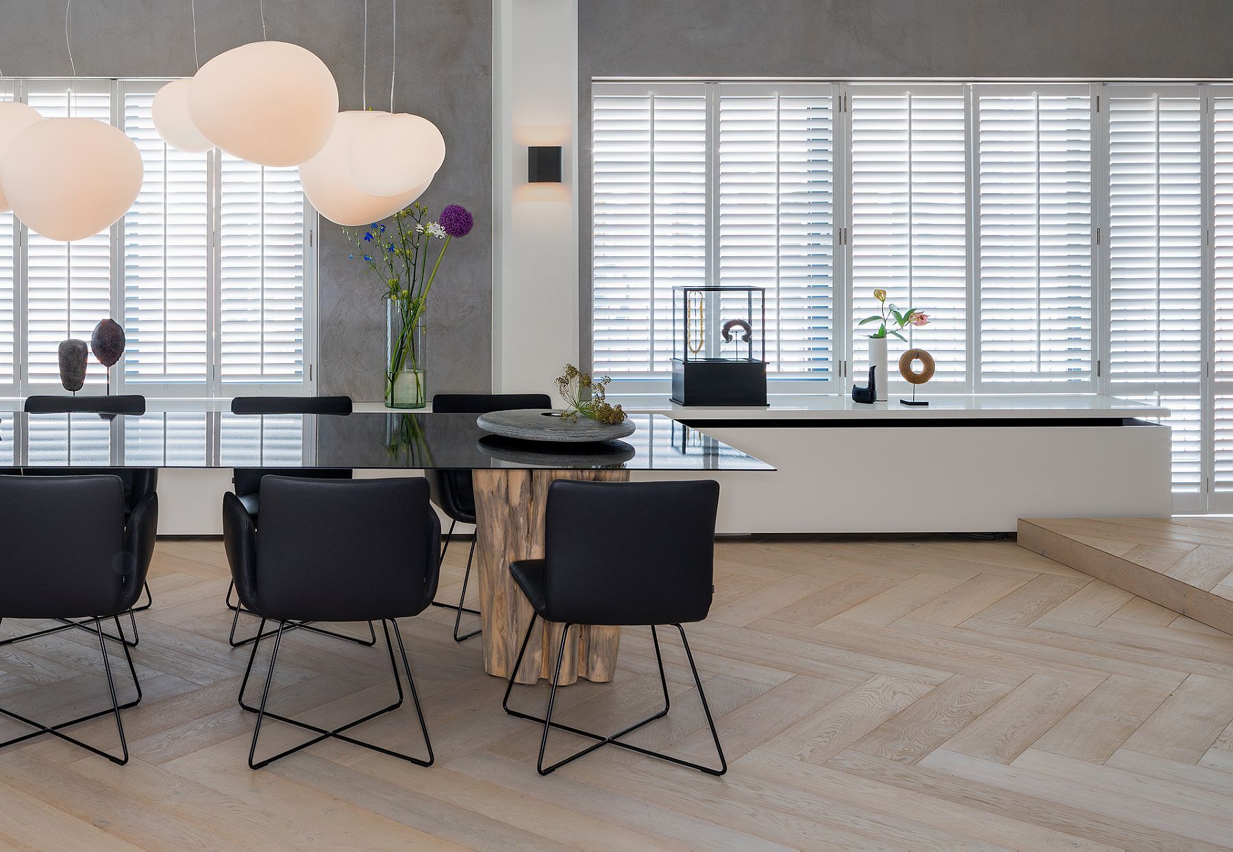 Dining table with tree trunk base and custom tanletop in steel