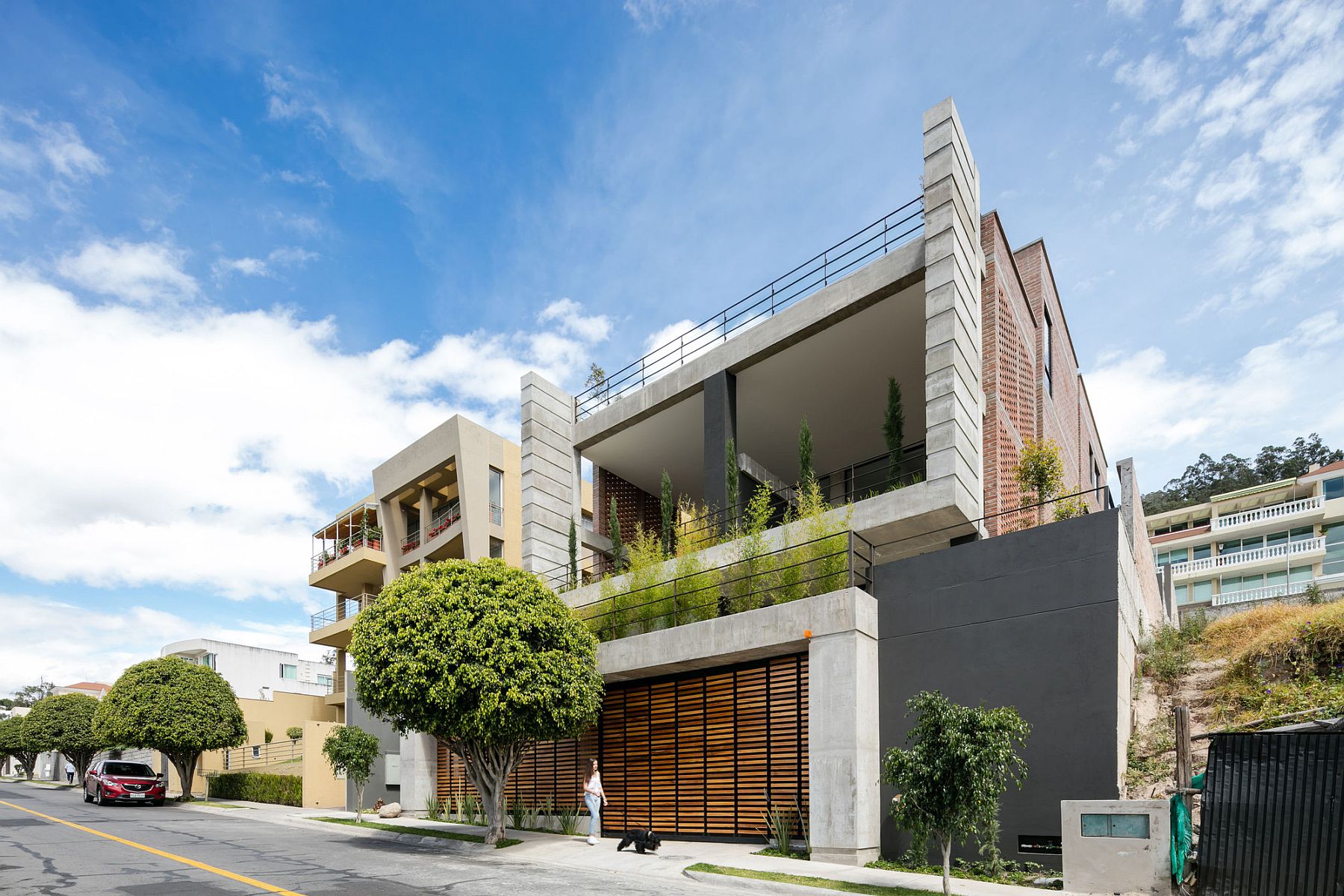 Double story porch shapes the street facade of the house