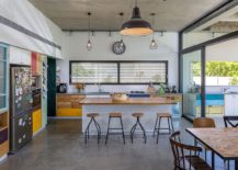 Exposed-concrete-floor-and-ceiling-of-the-breezy-family-home-in-Hofit-Israel-217x155