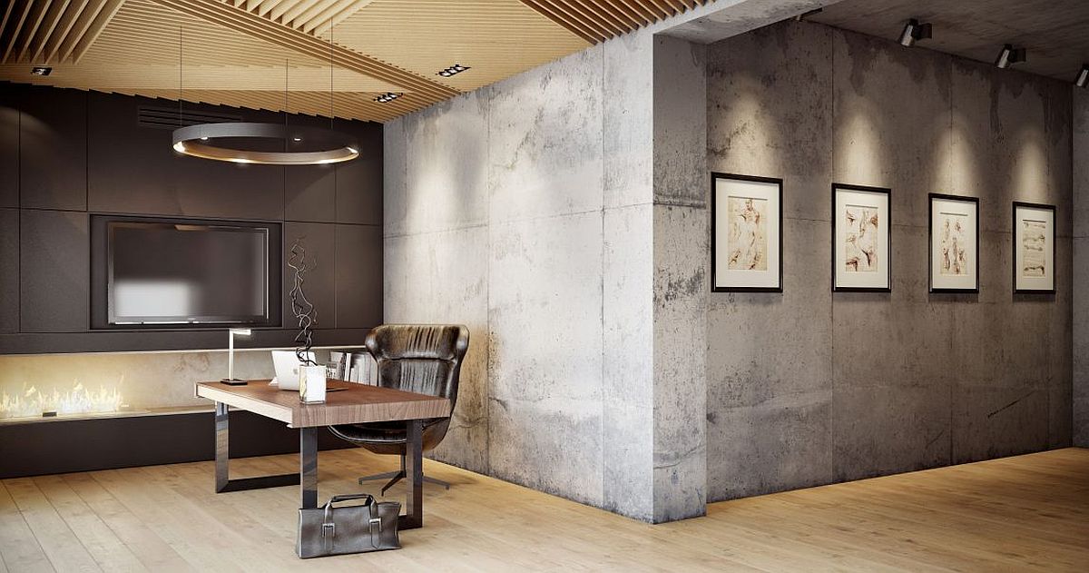 Exposed concrete walls create a unique gallery wall and home office