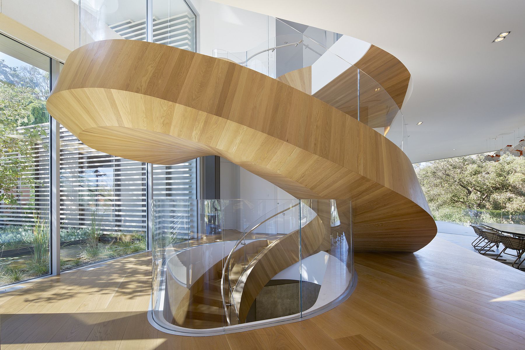 Exqlusive helical staircase design steals the show inside the sophisticated LA home