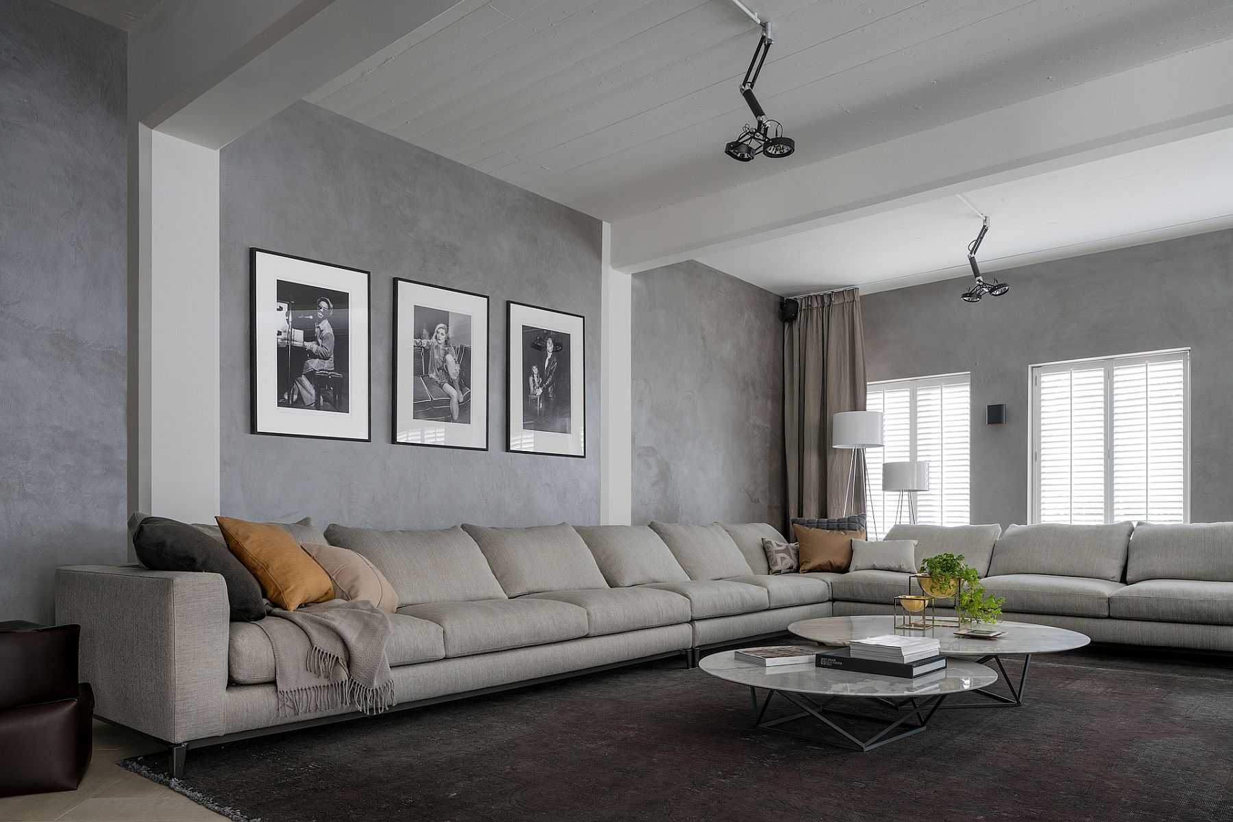 Fabulous Minotti corner sofa in gray for the industrial loft in Brussels