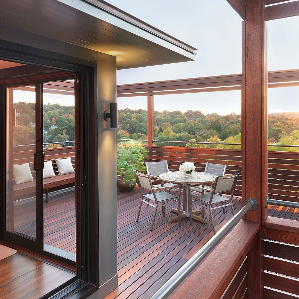 Fabulous modern mahogany rooftop deck with forest views