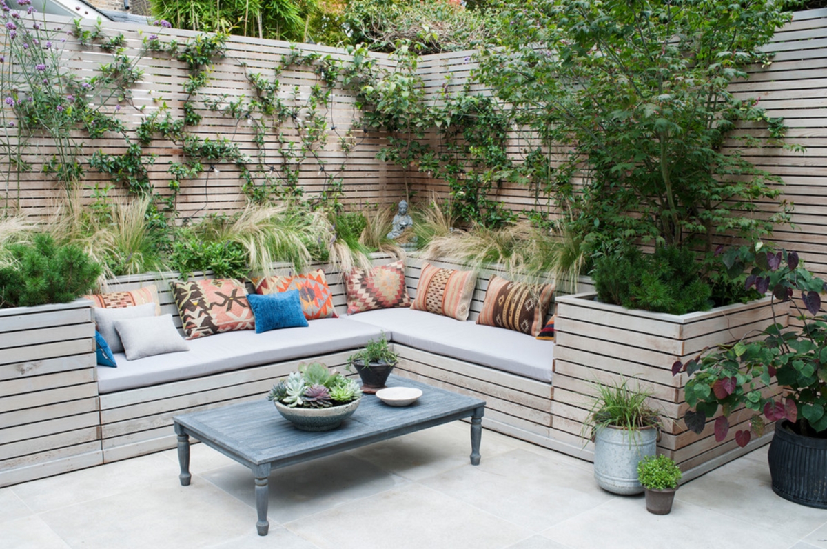 Fenced patio with a tile floor