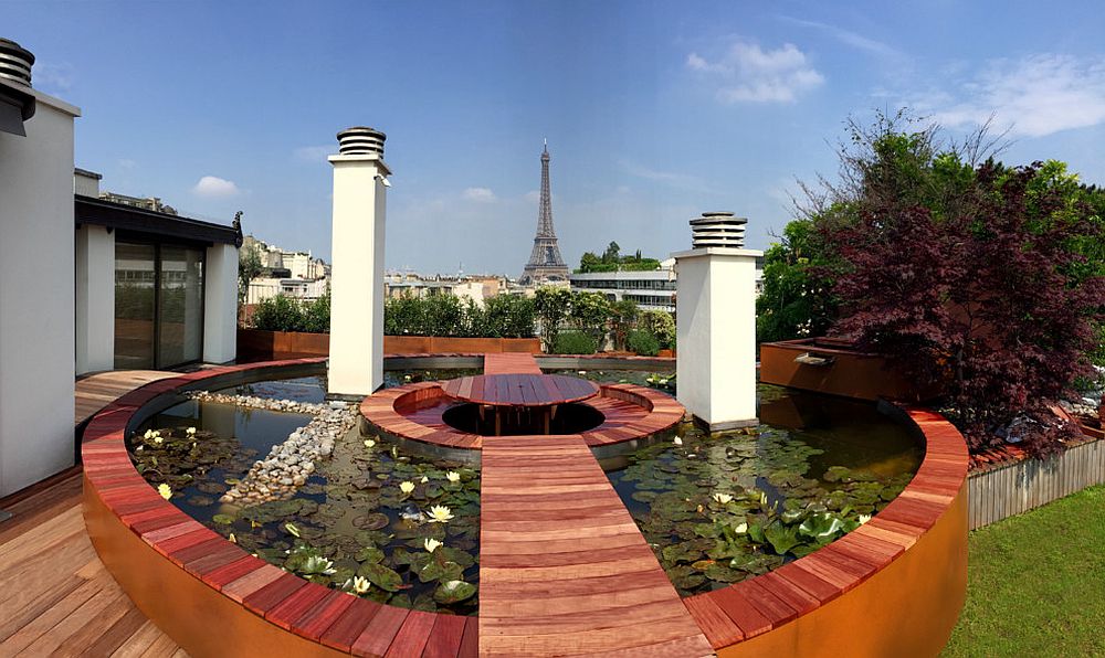 Few gardens and decks offer a view as stunning as this in Paris! [Design: Architecte Paysagiste Scènes d'extérieur]