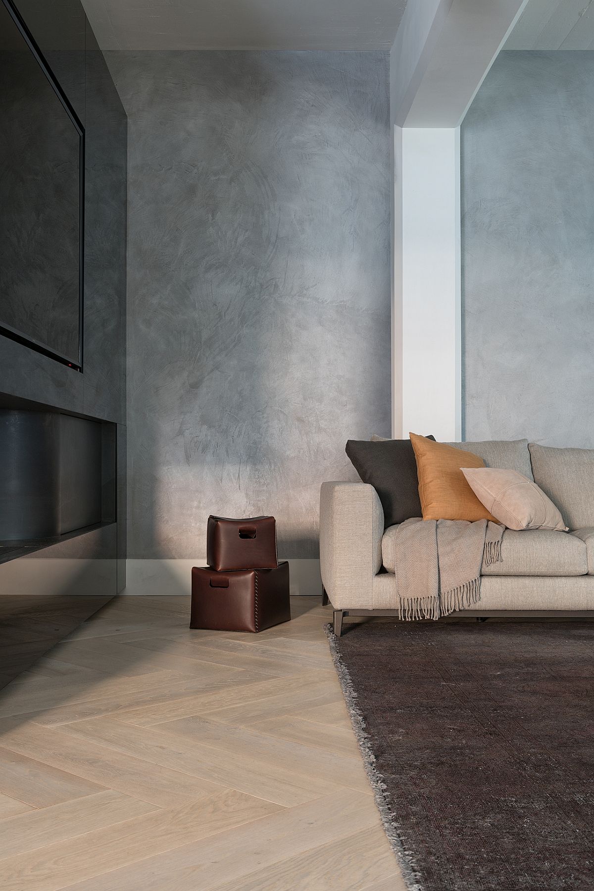 Flooring and walls bring texture and contrast to the industrial loft