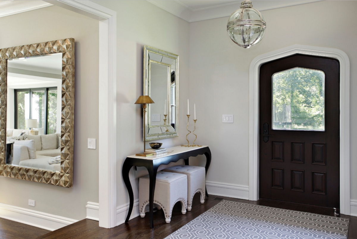 Foyer with a console table via 2 Design Group