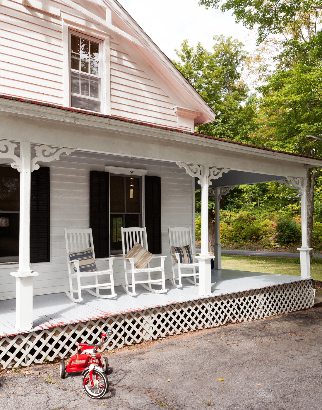 Front porch with rocking chairs (photo via Lonny)