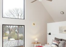 Gabled-roof-gives-the-bedroom-a-high-ceiling-217x155