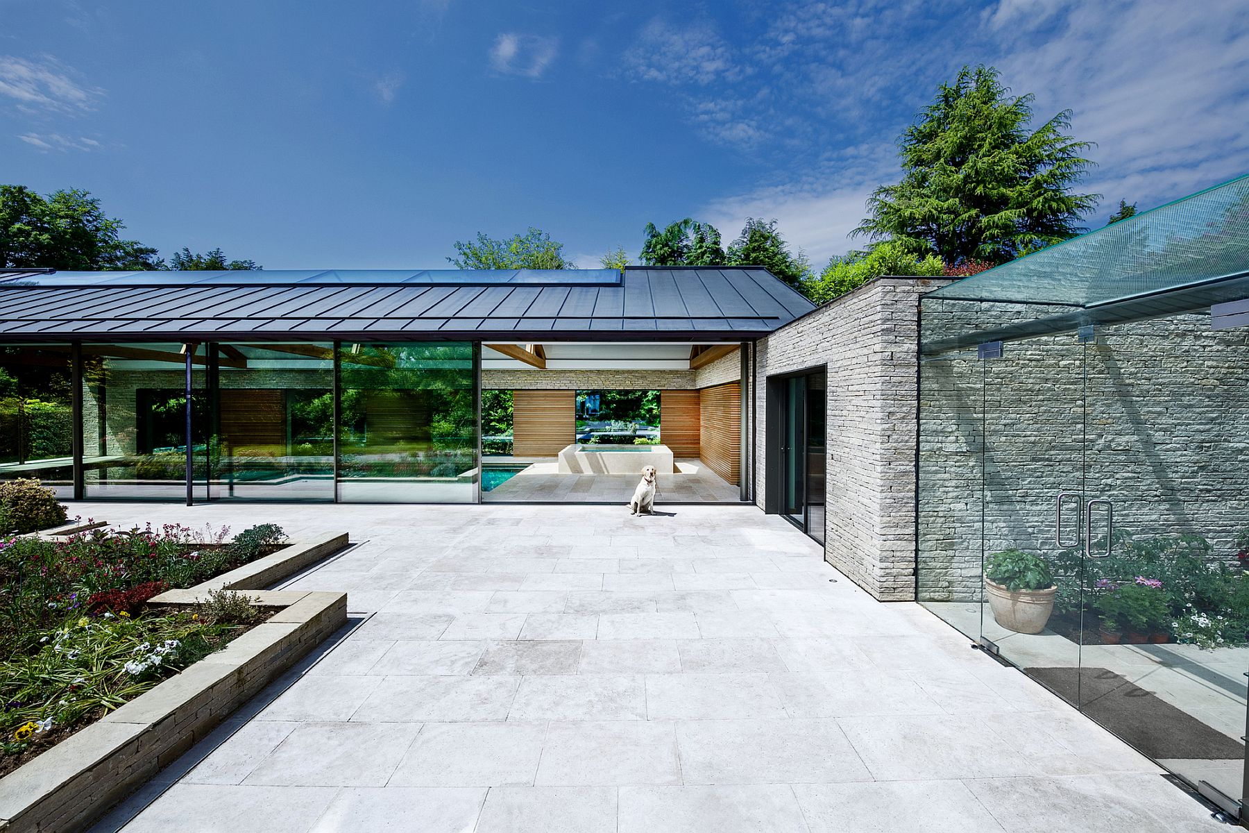 glazed-sliding-glass-doors-reflect-the-landscape