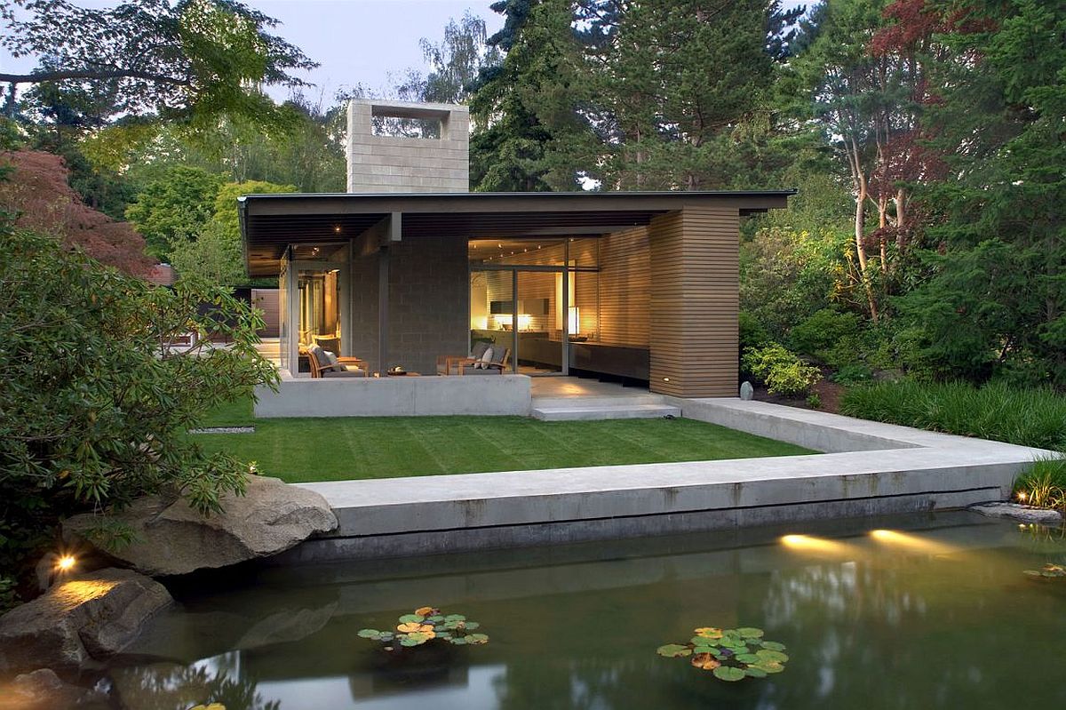 Gorgeous ponds surround the stylish modern cabin-styled home in Seattle