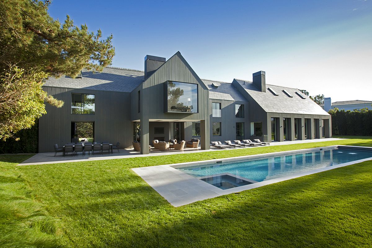 Gray-painted cedar and slate roof tiles shape the exterior of the revamped home