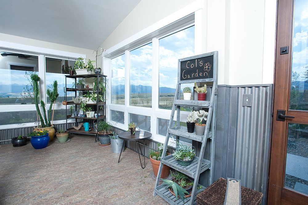 Indoor vertical garden or herb garden brings greenery to the spacious sunroom [Design: Penny Lane Home Builders]