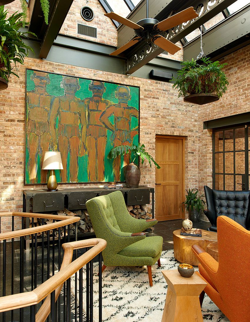 Industrial sunroom with midcentury decor, bright wall art and tropical ceiling fan