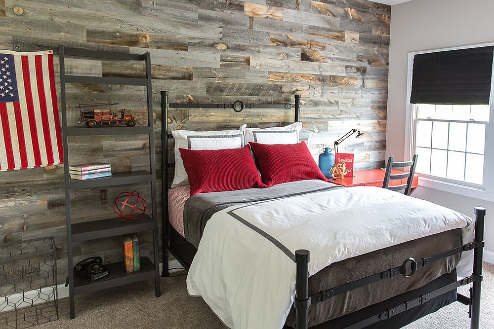 Iron bed and reclaimed wood wall bring plenty of texture to the boys' bedroom [From: Haus Interior Design / Helen John Photography]