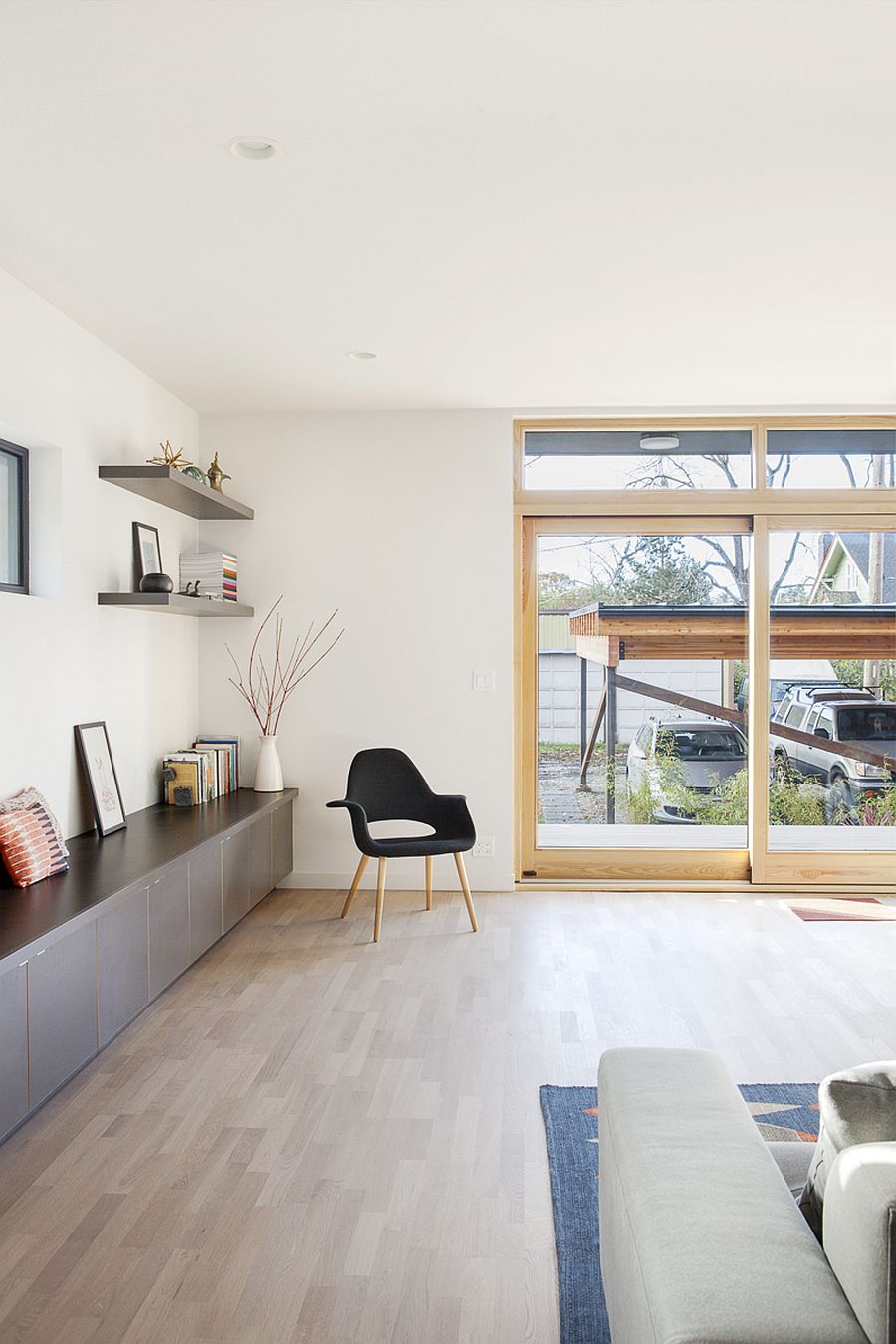 Living room with sleek media unit and living room decor