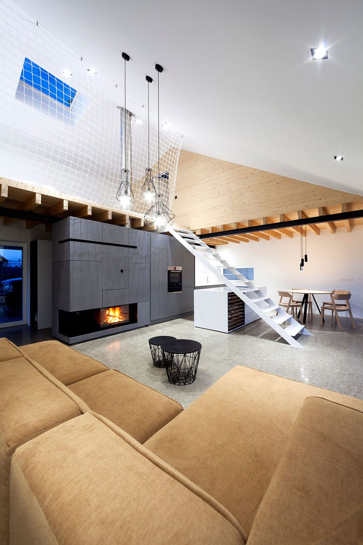 Loft style interior of the Slovakian home with mezzanine level