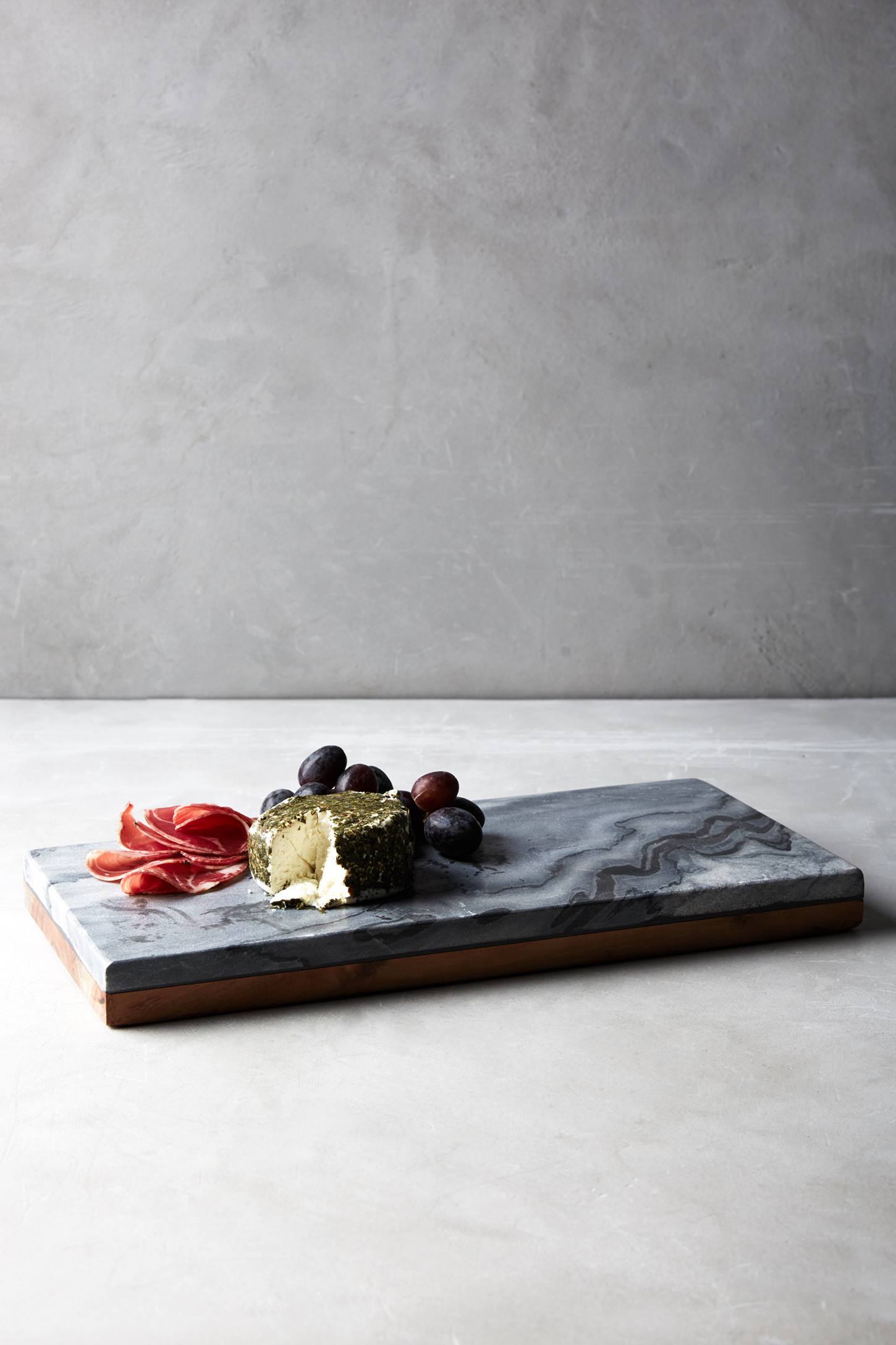 Marble and acacia wood serving board from Anthropologie