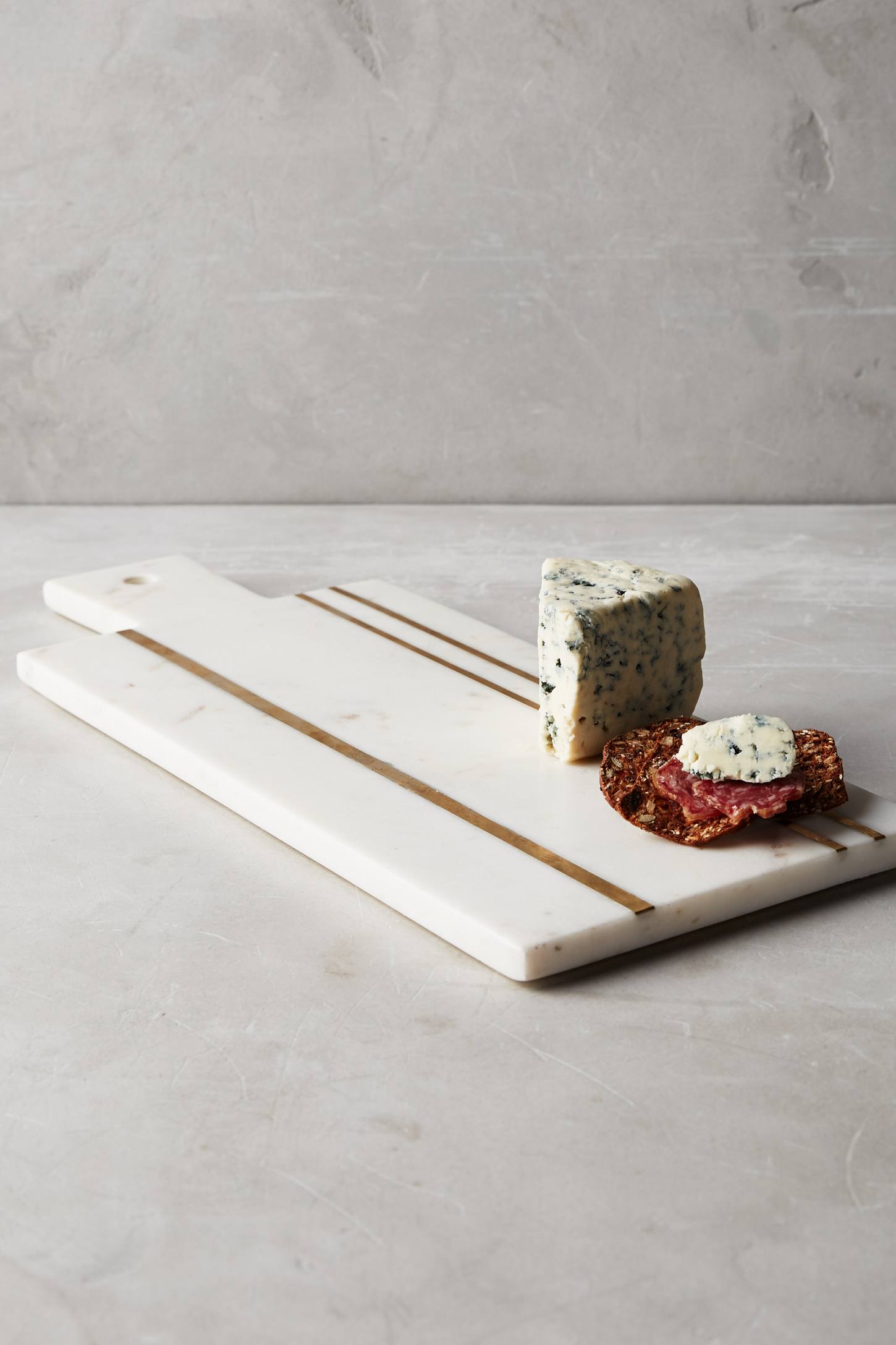 Marble and brass cheese board from Anthropologie