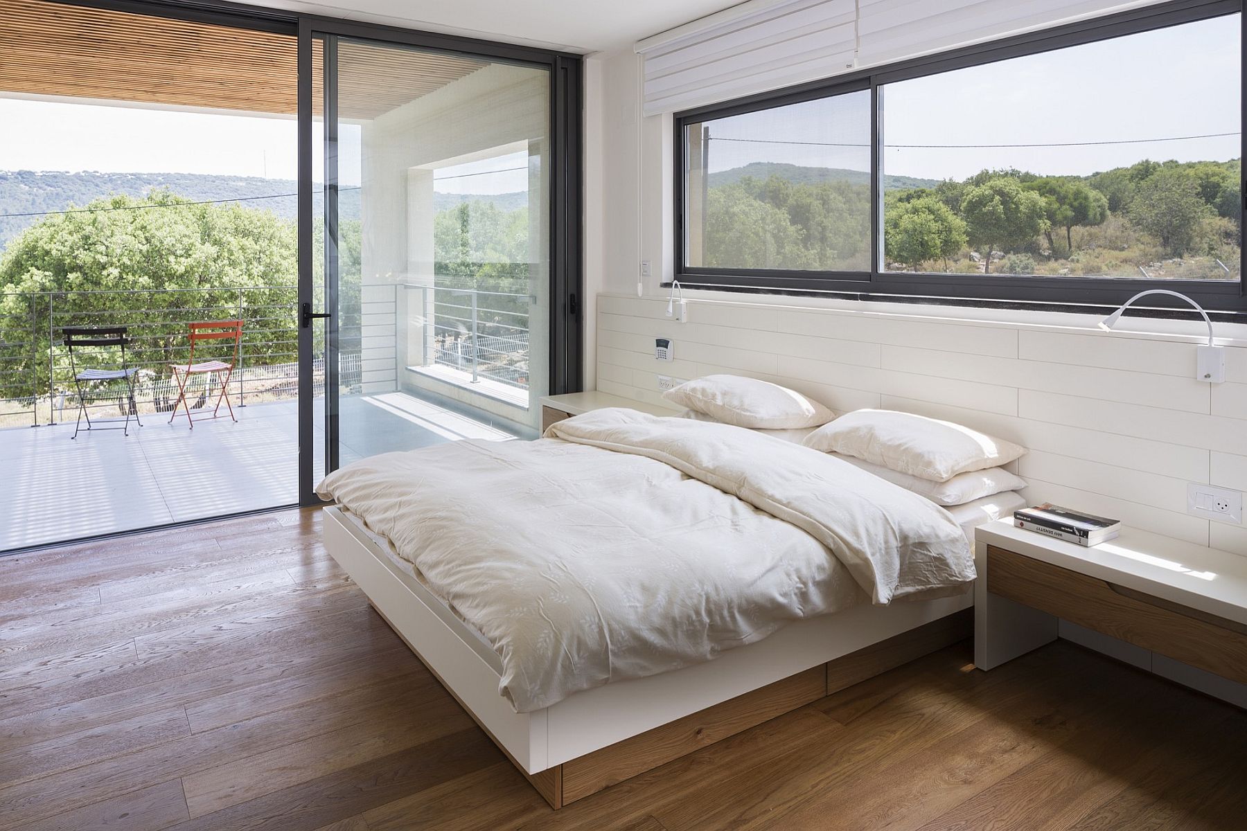Master bedroom and deck outside with unabated views of the scenery outside