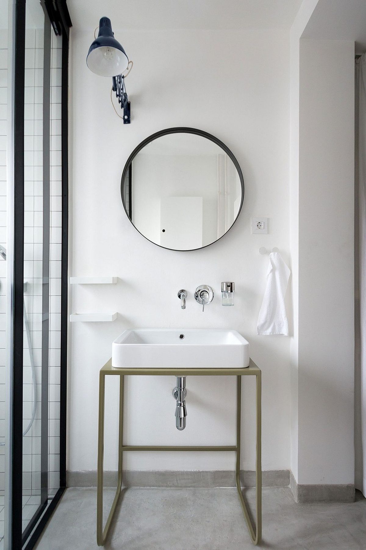 Minimal sink and vanity design with mirror above it