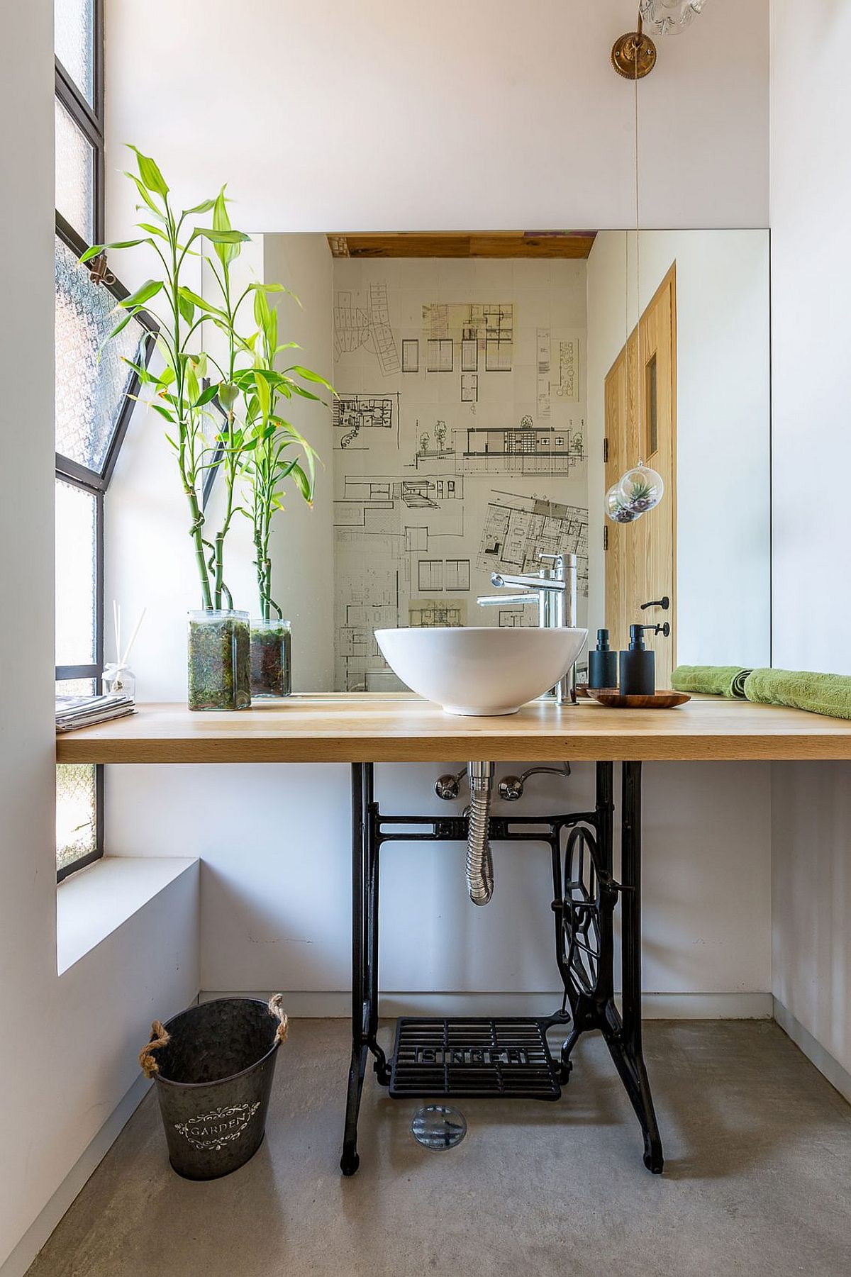 Old sewing machine turned into custom bathroom vanity