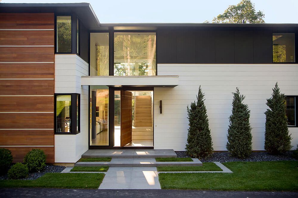 Pivoting wood front door and large foyer welcome you at the Weston house