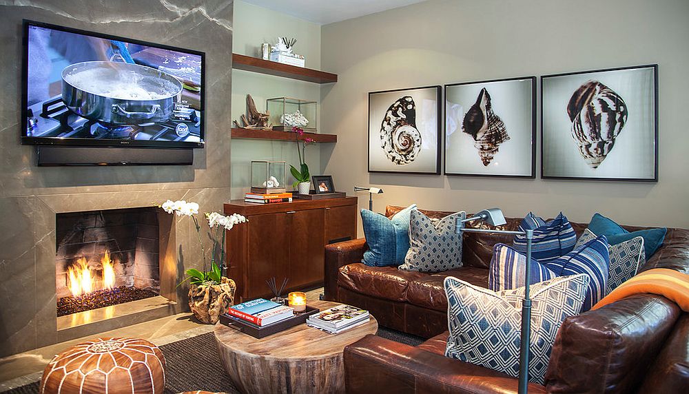 Refined beach style home theater with fireplace and striking wall art [From: Leo Parrella Design Group / Ed Olen Photography]