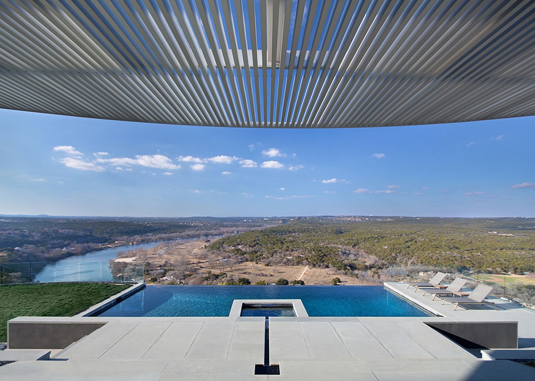 Renovated Austin home offers a view of Lake Austin and the rolling hills