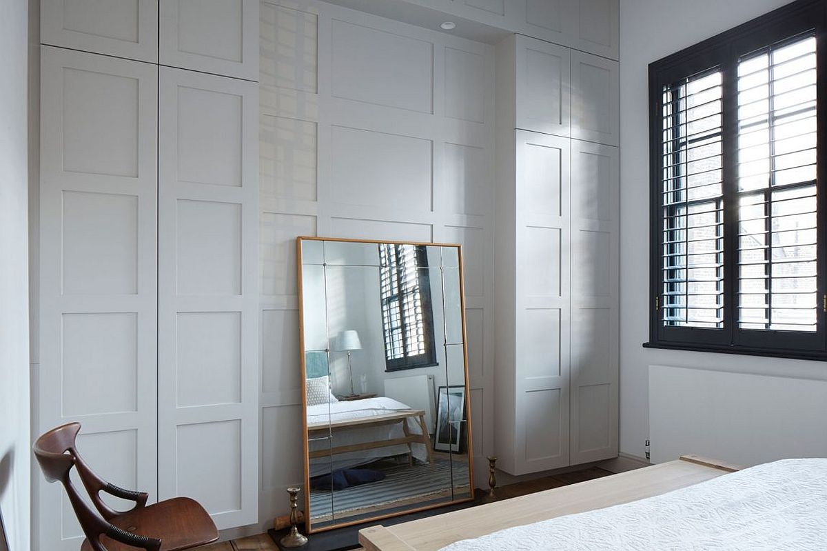 Simple and elegant bedroom in white with traditional decor