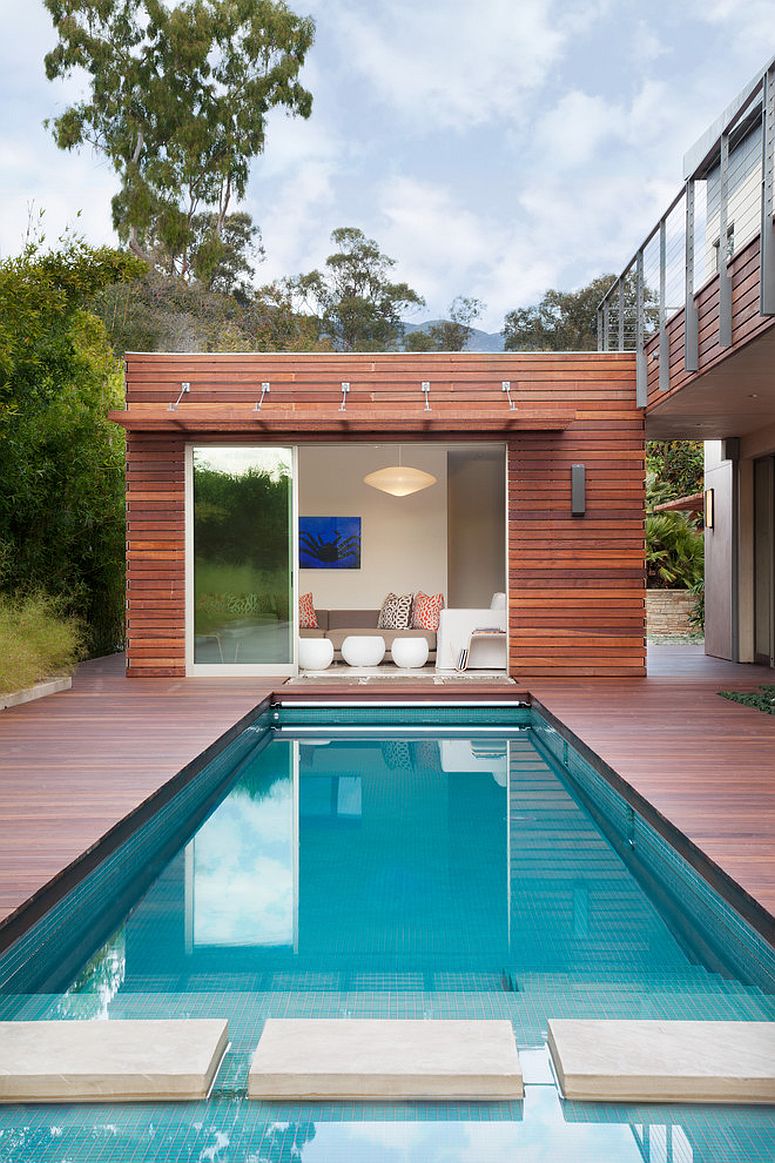 Small and stylish contemporary pool house packs quite a punch!